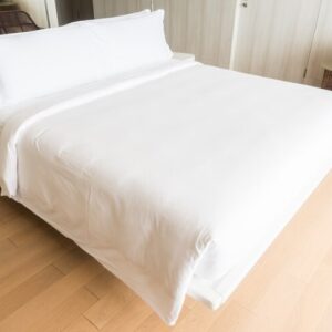 double-bed-with-white-pillows